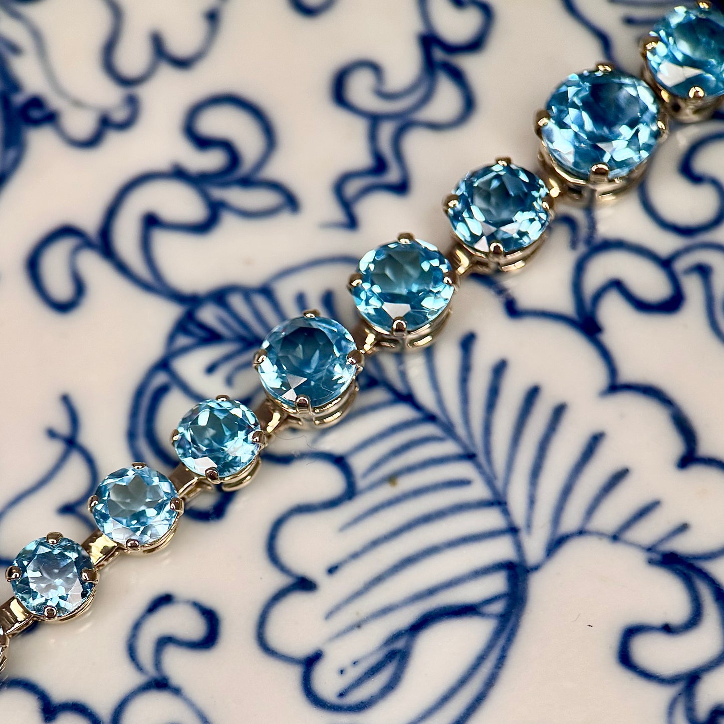 Topaz 9 Carat Gold Graduated Line Bracelet
