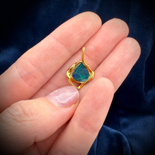 Boulder Opal Pendant set in 18K Gold. (Pendant only)