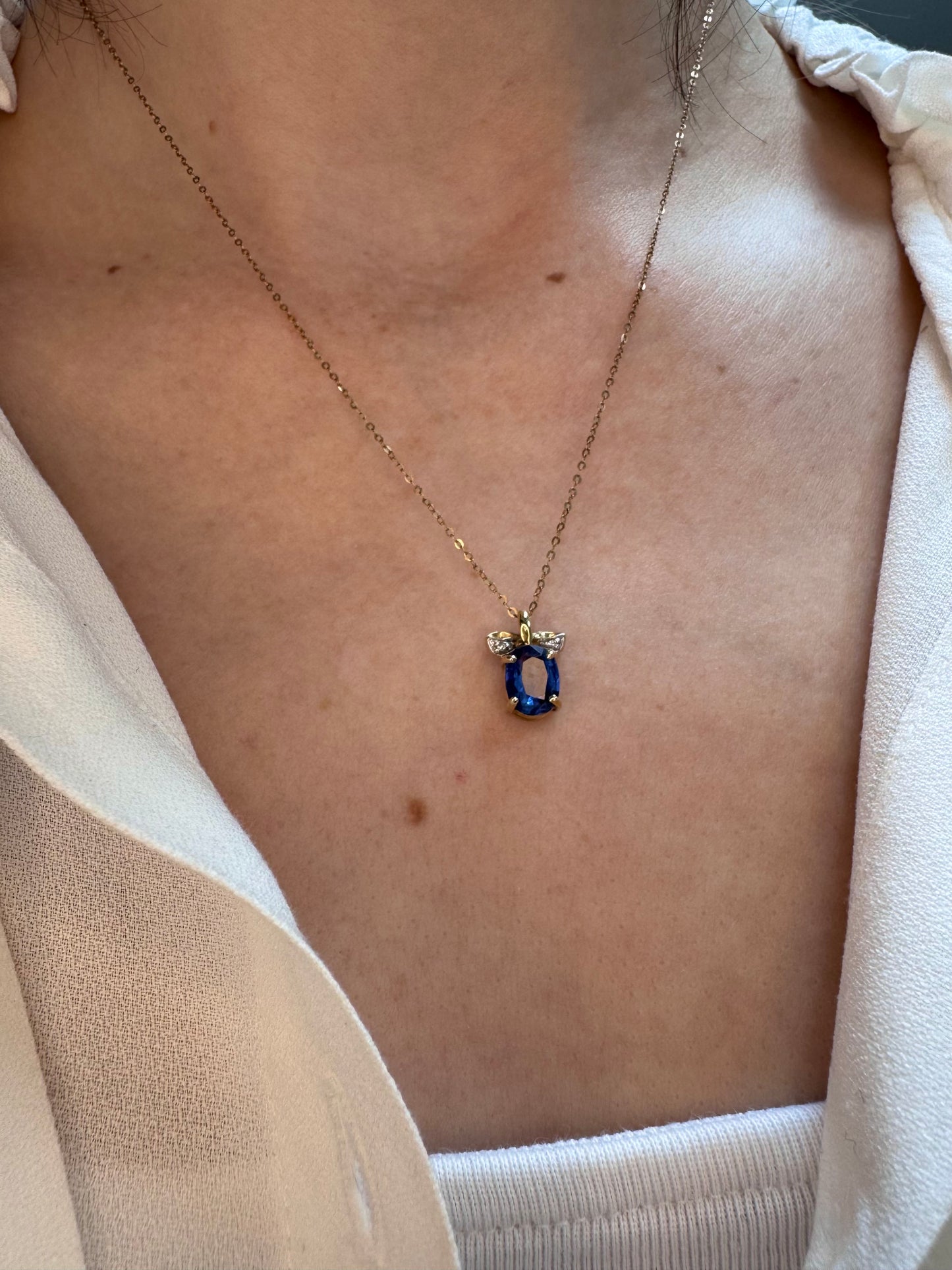 9ct Gold Kyanite Solitaire & Diamond “Bow” Necklace