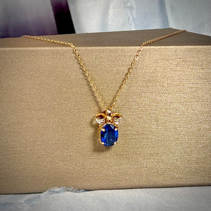 9K Gold Kyanite Solitaire & Diamond “Bow” Necklace